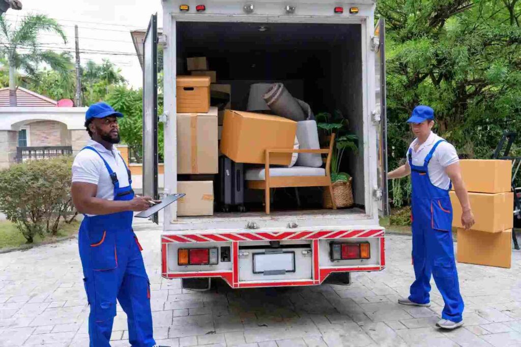 Our long distance movers in wesley chapel fl team securing items in the truck for a long distance move.