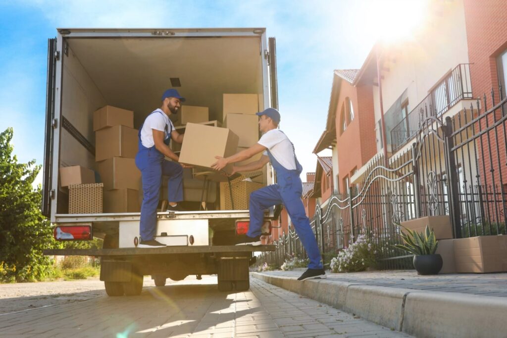 Our local movers in wesley chapel fl crew providing secure packing and loading services.